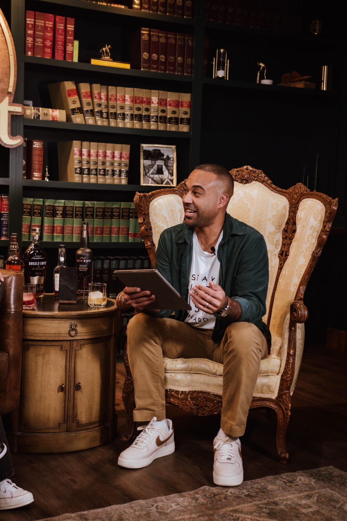 Host Arian Green in conversation during a taping of AI on the Rocks at The Fort